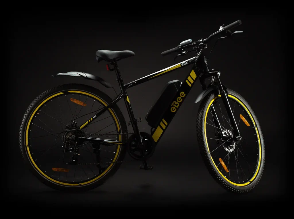 eBee eBX: Escape the everyday. Side profile reveals a sleek electric mountain bicycle built for 90km adventures with an extra large rechargeable battery. Built for everyday commute and to explore beyond the city limits.